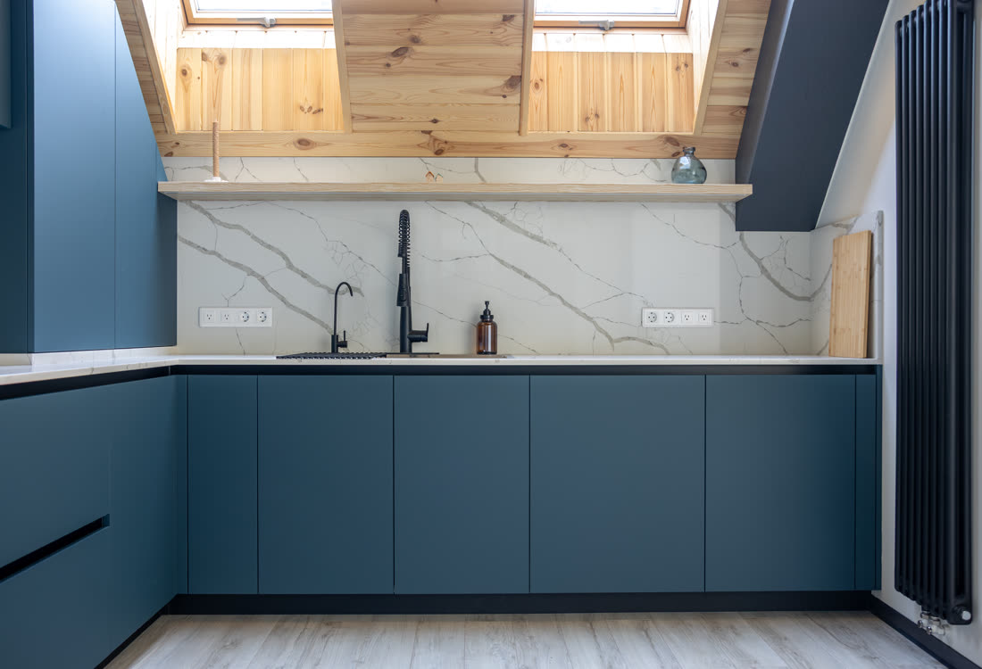 A compact second-suite kitchen in a converted space