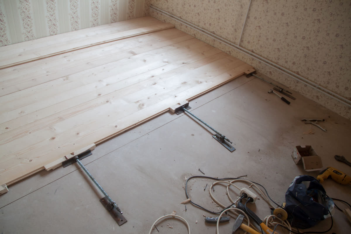 A plywood subfloor levelled and refastened before new flooring goes down