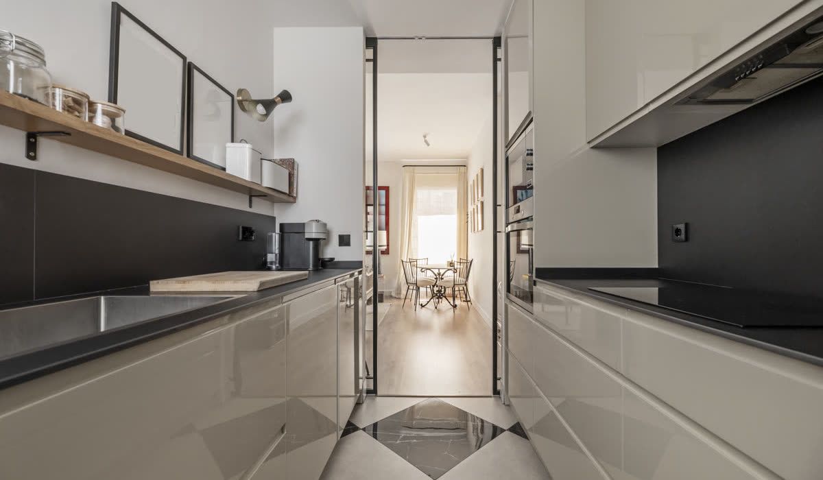 A finished tiled kitchen floor with even grout lines